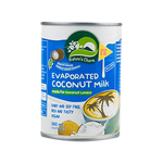 Cans of Nature's Charm evaporated coconut milk, healthy dairy alternative with creamy texture, on a white background.