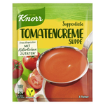 Creamy tomato soup in a bowl, featuring fresh tomatoes and herbs from Tomatencreme brand for a flavorful grocery product.