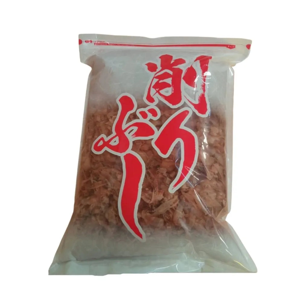 Dried bonito flakes from Siam Food Services, 500g package, showing thin, light brown fish flakes used in Japanese cuisine.