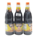 Three bottles of Golden Mountain Soy Sauce, 600ml each, in clear plastic bottles with golden labels, placed on a white background.