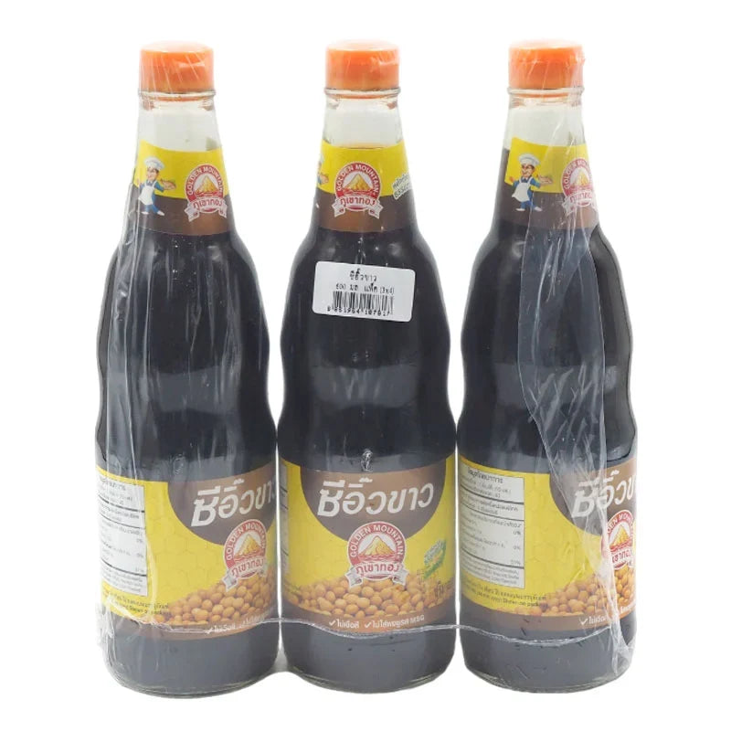 Three bottles of Golden Mountain Soy Sauce, 600ml each, in clear plastic bottles with golden labels, placed on a white background.