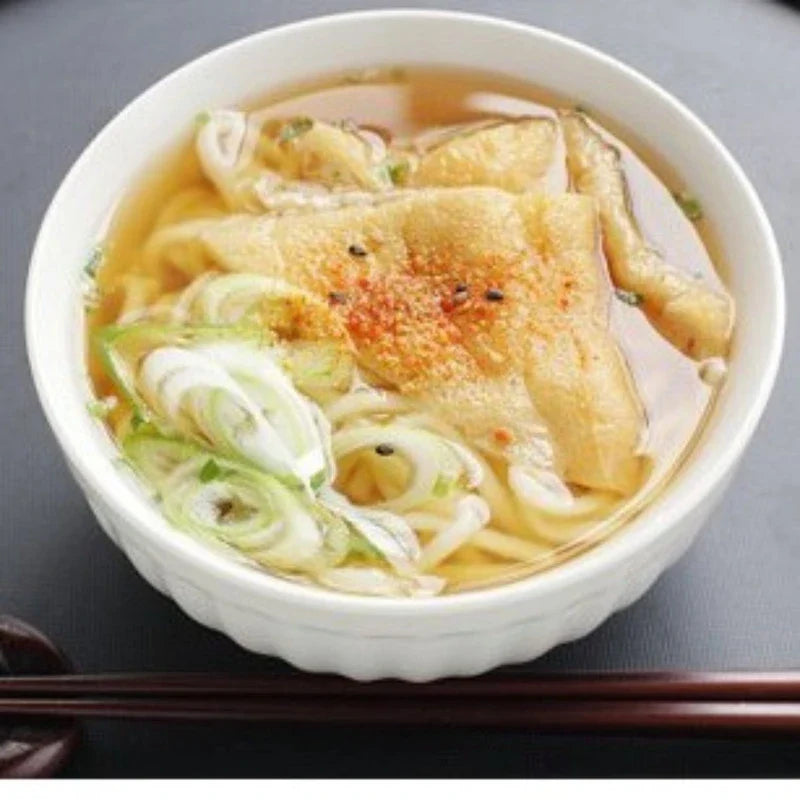 Nisshin No.1 Udon 200g dry Japanese wheat noodles in a clear package, ideal for soups and stir-fries.