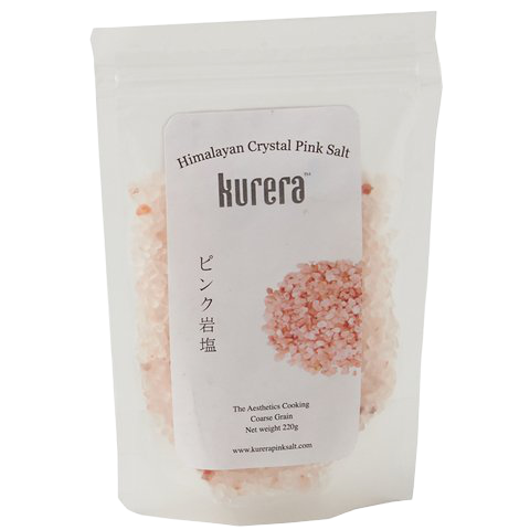 Kurera Himalayan Crystal Pink Salt in a clear container, showcasing pink salt crystals used for cooking and seasoning.