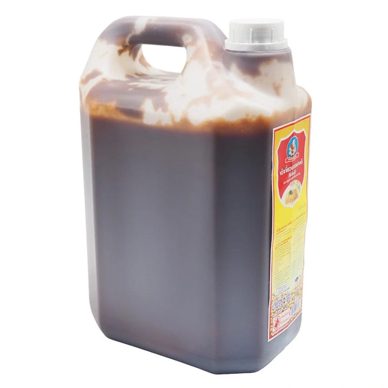 DEK SOM Boon soybean paste 5kg jar, traditional dry grocery item, showing the dark, thick soy paste in a large container
