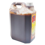 DEK SOM Boon soybean paste 5kg jar, traditional dry grocery item, showing the dark, thick soy paste in a large container