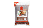 J-lek Meatball Dipping Sauce in a 000g bag, dry grocery product, with a smooth, dark sauce and meatballs on a plate.