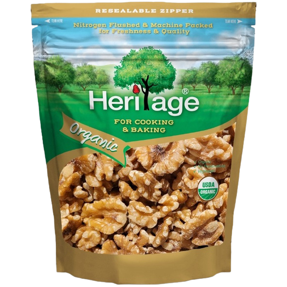 Heritage Organic Walnuts in a bowl, close-up of crunchy, natural confectionery snack with whole walnuts from Heritage brand.