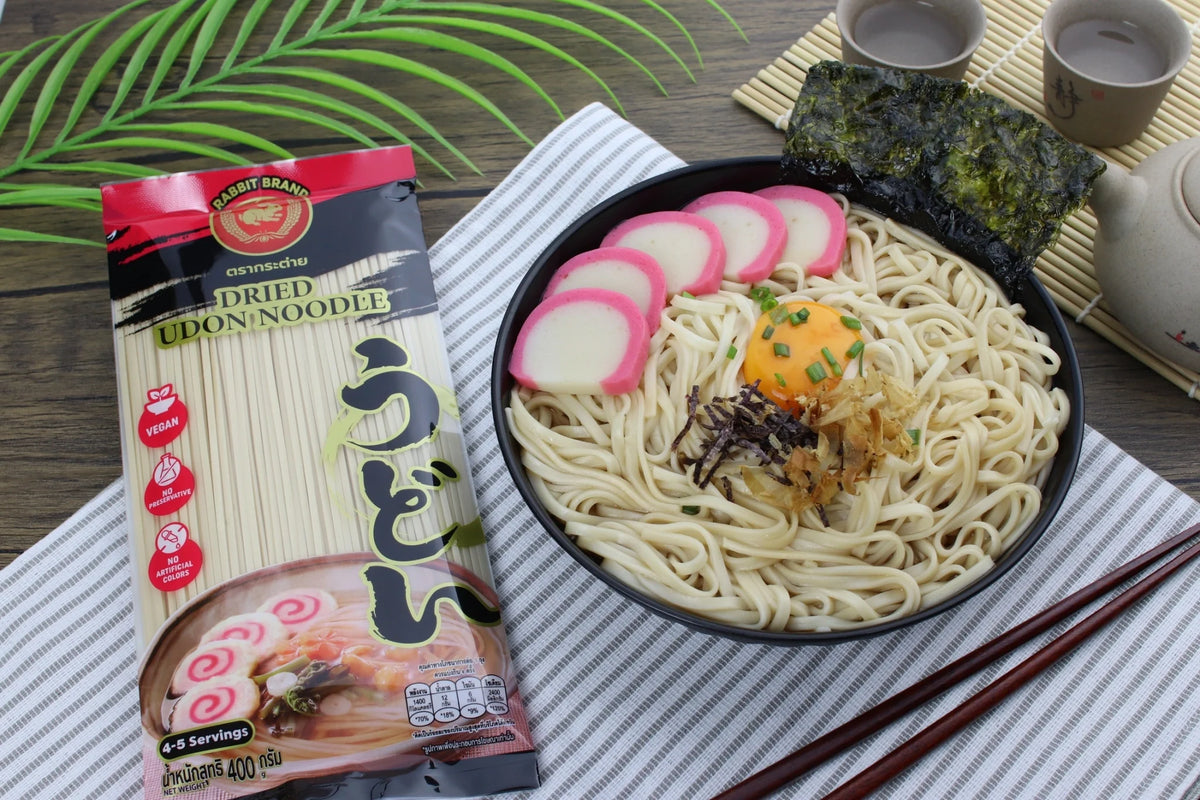 Dry Rabbit Brand Udon Noodles package, featuring thick, white udon noodles in clear plastic packaging with branding.