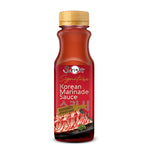 Bottle of Sukishi Korean Marinade Sauce in a grocery setting, showing the label and sauce inside the clear bottle.