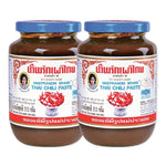 Maepranom Chili Paste in a 513g jar, shown in a pair of containers, traditional Thai dry grocery product with vibrant red chili content