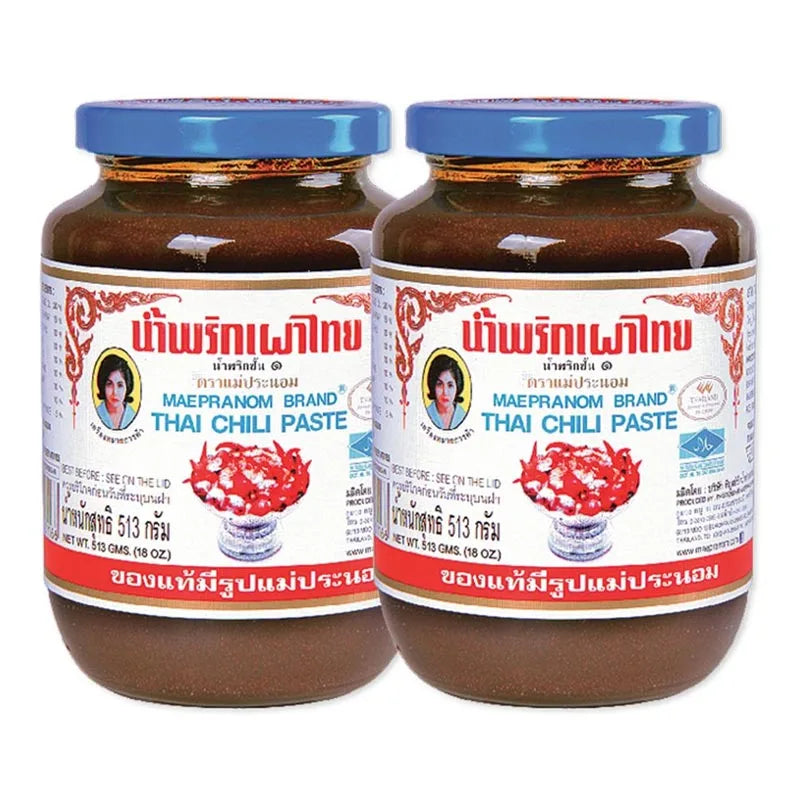 Maepranom Chili Paste in a 513g jar, shown in a pair of containers, traditional Thai dry grocery product with vibrant red chili content