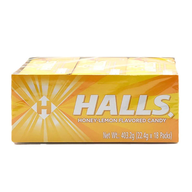 HALLS Lemon Soothers 18-tablet pack of lozenges for sore throat relief, featuring lemon flavor and dry grocery snack packaging.