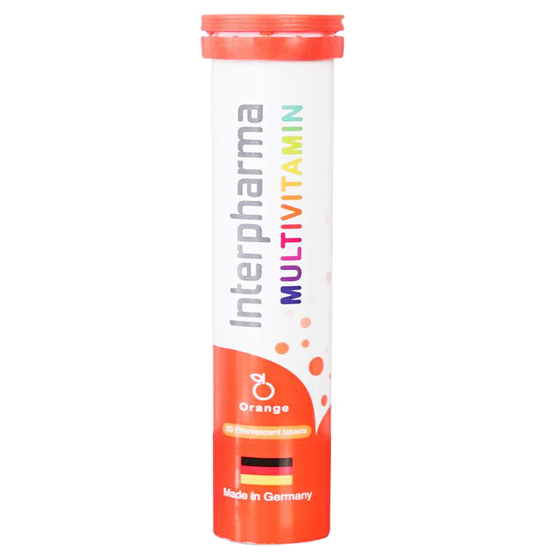 Interpharma Multivitamin Effervescent tablet dissolving in glass, healthy dietary supplement with colorful fruit flavor.