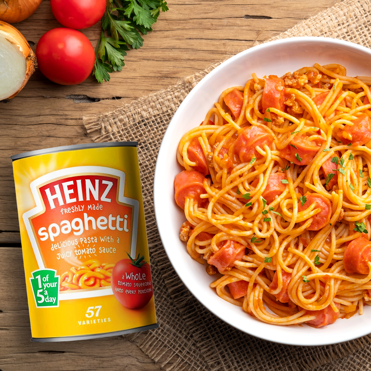 Canned Heinz Spaghetti in classic tomato sauce with visible spaghetti and rich tomato sauce inside a can