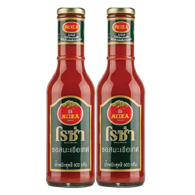 Two bottles of Roza Tomato Ketchup 600g, dry grocery product, showing the red ketchup bottles with labels and caps.