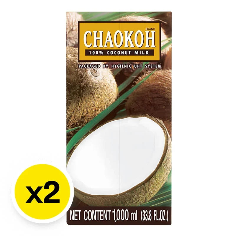 Chaokoh coconut milk in 1L cartons, two bottles of Thai dry grocery product with white and green labels on a plain background.