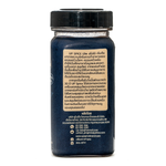 United Cajun Spice container with vibrant label, showcasing a blend of Cajun seasonings for flavorful cooking.