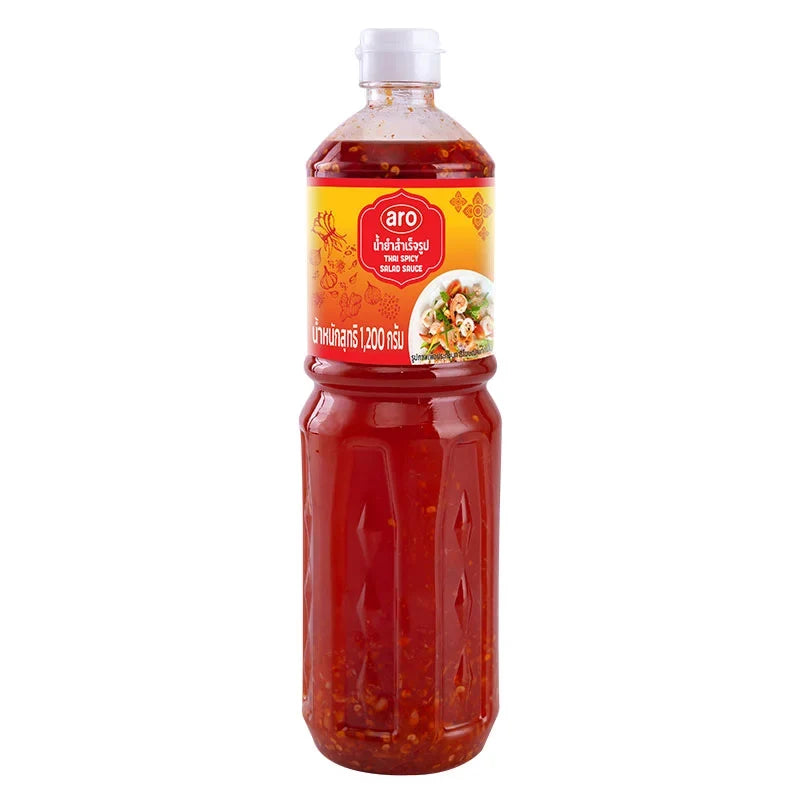 ARO Thai Spicy Salad Sauce 1.2kg jar, showcasing the vibrant spicy sauce used in Thai salads in a clear container.