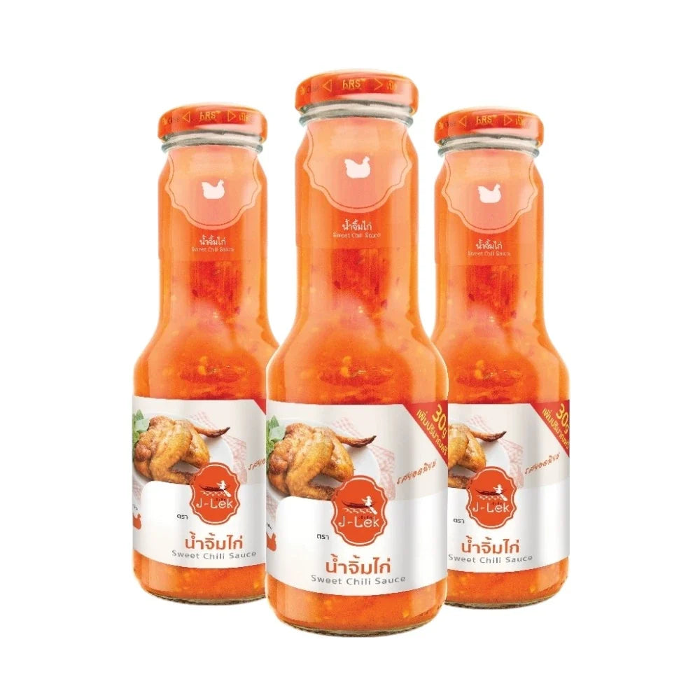 J-lek Jae Lek Chicken Sauce in a 390g glass bottle, ideal for dry grocery use, with a clear label and glossy glass finish.
