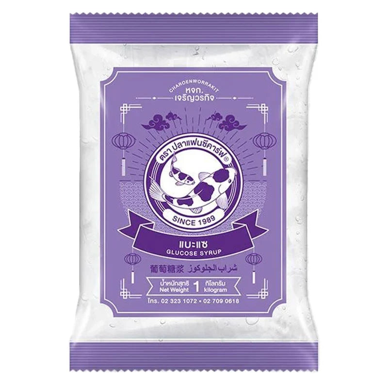 FANCY CARP Fancy Carp glucose syrup 1kg in a clear plastic bottle, suitable for baking and cooking in dry grocery products.