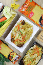 Dry package of Rabbit Brand Khao SOI noodles, Thai-style rice noodles for cooking, with colorful packaging and branding visible.