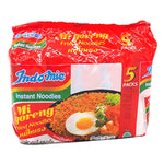 Indo MIE Mi Goreng fried noodles in 85g packs, dry grocery product by INDO MIE, showing cooked noodles in a bowl with seasonings