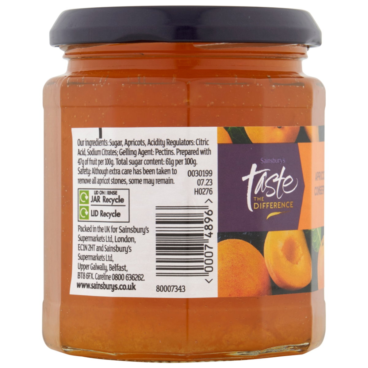 Sainsbury's Taste The Difference apricot conserve in a jar with apricots and spreadable conserve on a white background.