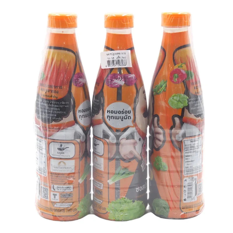 Golden Mountain Cooking Sauce 700ml bottle, part of a set of three, in a clear plastic bottle with golden and red label.