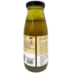 King Organic Fresh Dressing bottle showing clear label and vibrant ingredients in a grocery setting.