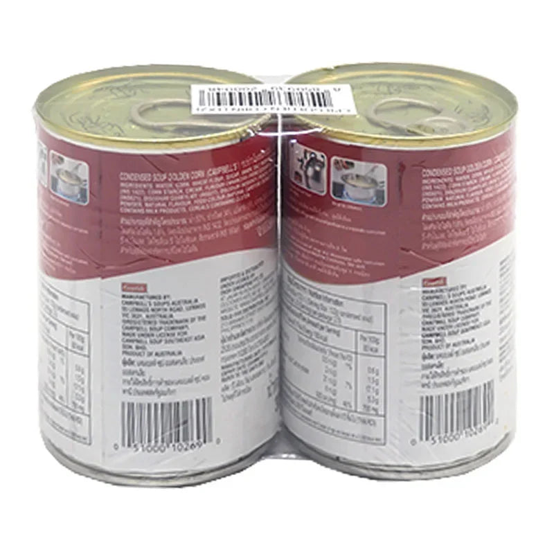 CAMPBELL'S Cream of Sweet Corn condensed soup in 305g cans, displayed together, in a grocery store setting