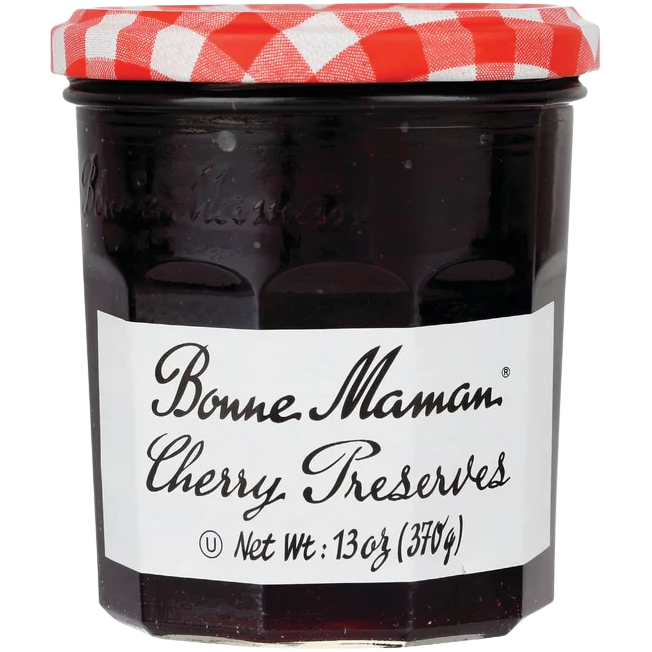 Jar of Bonne Maman Cherry Preserves with a label, showcasing bright red cherries and classic packaging.