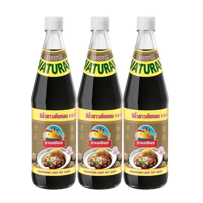 Nguan Chiang Mushroom Light Soy Sauce 700ml bottles in a three-pack, classic dry grocery condiment with mushroom flavor.