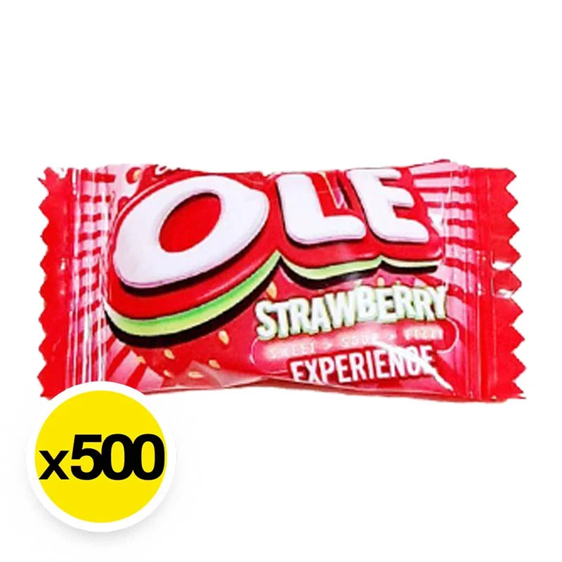 OLE Candy Strawberry dry snack in a colorful package, showing bright strawberry-flavored confectionery pieces.