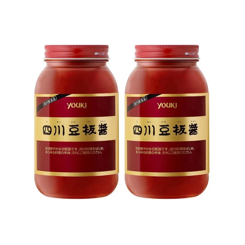 Youki Shisen Tobanjan Sichuan Chili Miso Doubanjiang sauce in a jar, showcasing vibrant red chili paste and label.