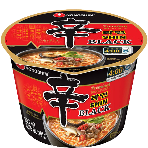 Nong Shim Shin Ramyun Black noodle soup package with steaming bowl of spicy instant ramen on a table