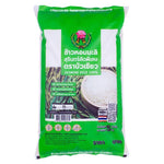 Buakaew Jasmine Rice 100% dry grocery 5kg bag with fluffy, white grains, showcasing the rice's texture and packaging.