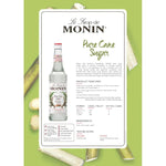 Bottle of MONIN Pure Sugar Cane Syrup 700ml, a natural sweetener for beverages and desserts in dry grocery.