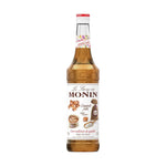 Bottle of Monin Salted Caramel Syrup in 700ml size, featuring a clear label with caramel flavor for coffee and dessert toppings.