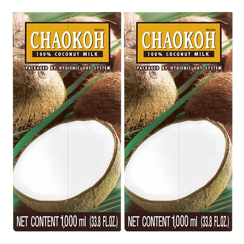 Chaokoh Coconut Milk 1L bottles in a pack of two, featuring the Thai brand logo and white coconut milk inside clear plastic bottles.