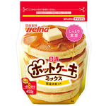 Nisshin Hotcake Mix package showing golden pancakes on a plate, ready to cook, in a grocery product image.