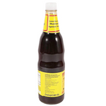 Golden Mountain Mushroom Vegetarian Sauce bottle, savory Asian grocery sauce with golden label and cap, for enhancing stir-fries and dishes.