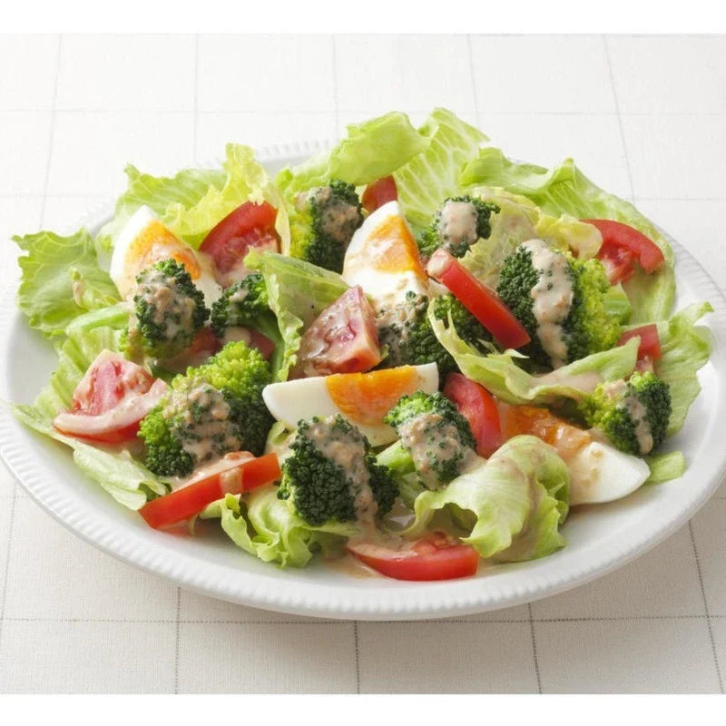 Kewpie Deep-Roasted Sesame Dressing 150ml bottle, Japanese dry grocery condiment with rich roasted sesame flavor.