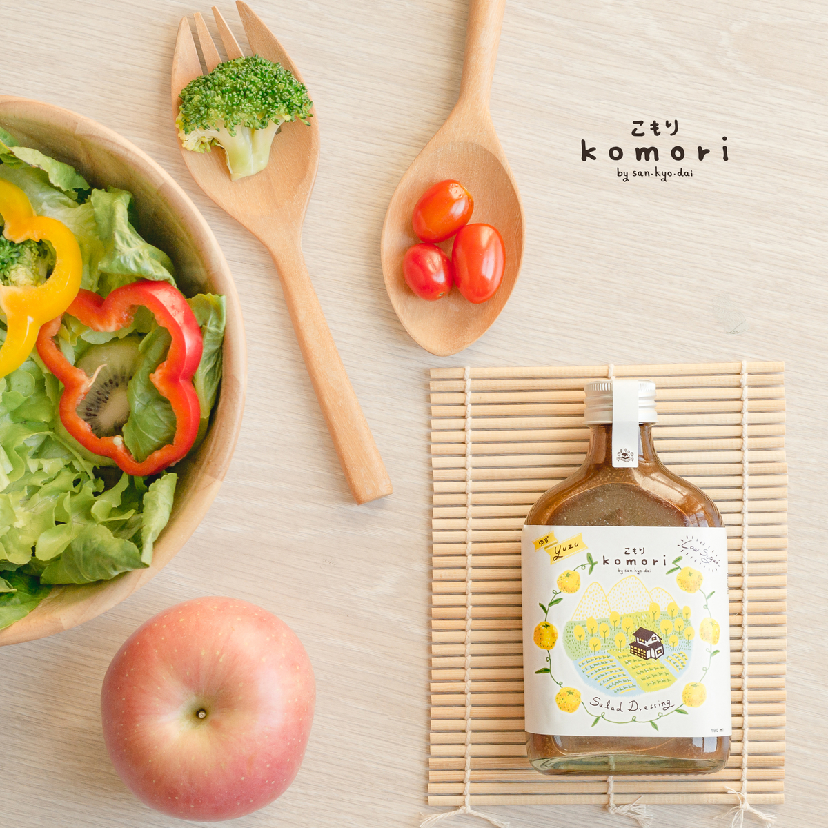 Bottle of Komori Salad Dressing Yuzu with label visible, showcasing a Japanese citrus-flavored dressing in a clear container.