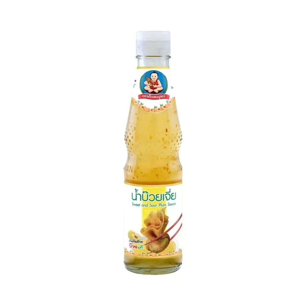 Deksomboon Plum Sauce 350g bottle, traditional Thai dry grocery condiment with rich, tangy flavor in clear glass bottle