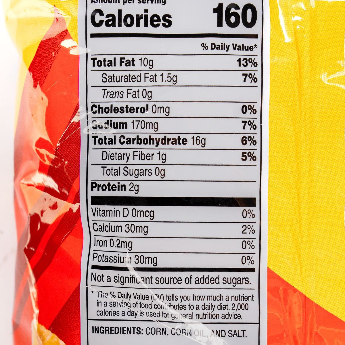 Fritos Corn Chips Regular in a bowl, showing crispy, golden Fritos snack pieces from the Fritos brand.