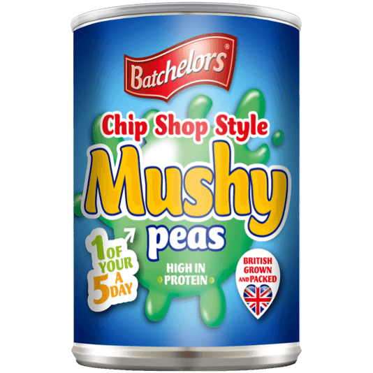 Cans of Batchelors Chip Shop Style Mushy Peas packed in a grocery store display, ready for cooking and serving.