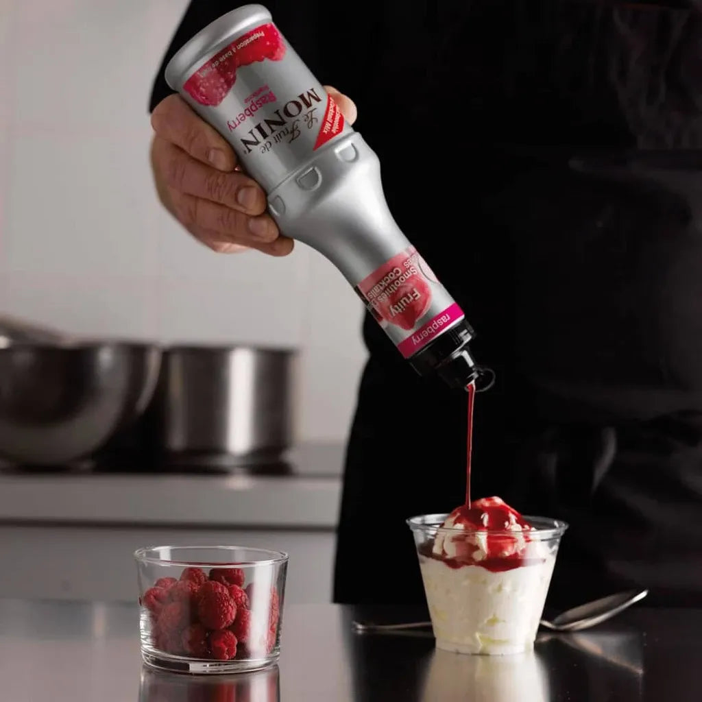 Bottle of MONIN Raspberry Fruit Mix 1000ml for dry grocery, showing the label and raspberry flavor details.