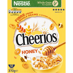 Bowl of Nestle Cheerios Honey cereal with honey-flavored oat rings on a white background