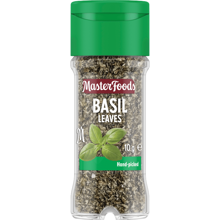 Fresh Masterfoods basil leaves in a grocery package, showcasing vibrant green herb suitable for cooking and garnishing.