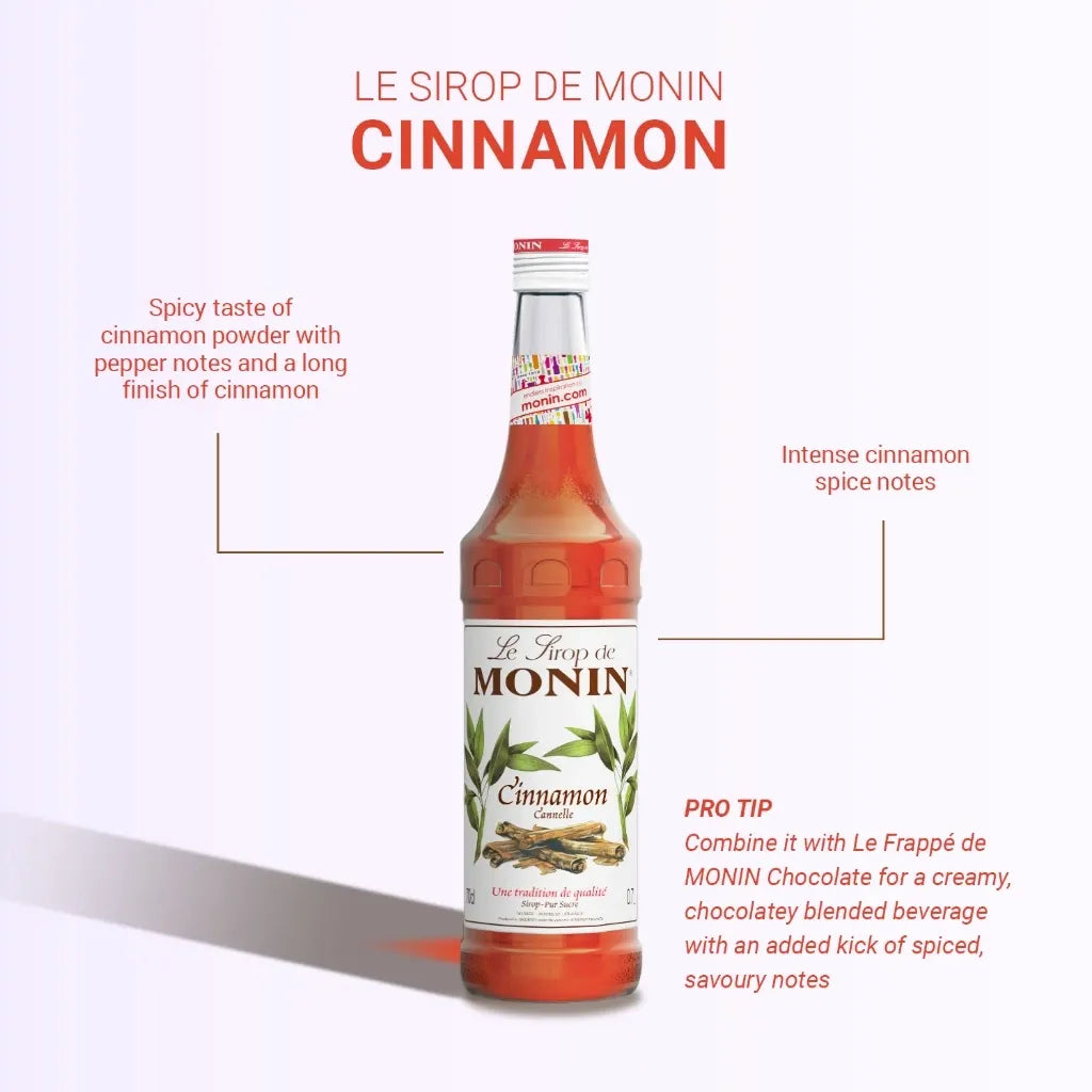 Bottle of MONIN Cinnamon Syrup in a 700ml clear plastic bottle with a black cap, suitable for flavoring beverages and desserts.